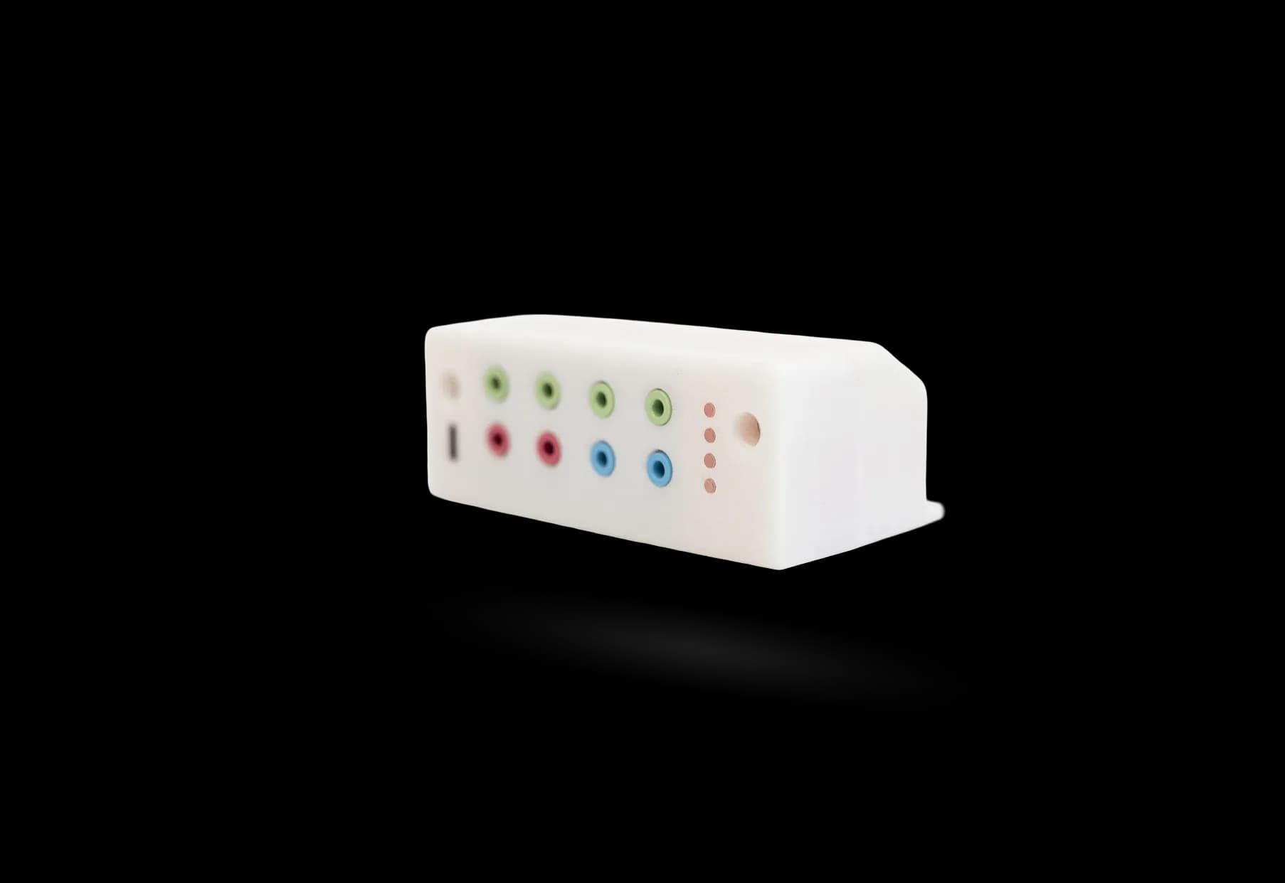 Compact FTL sensor interface module with multiple input ports for monitoring HVAC equipment and building systems.